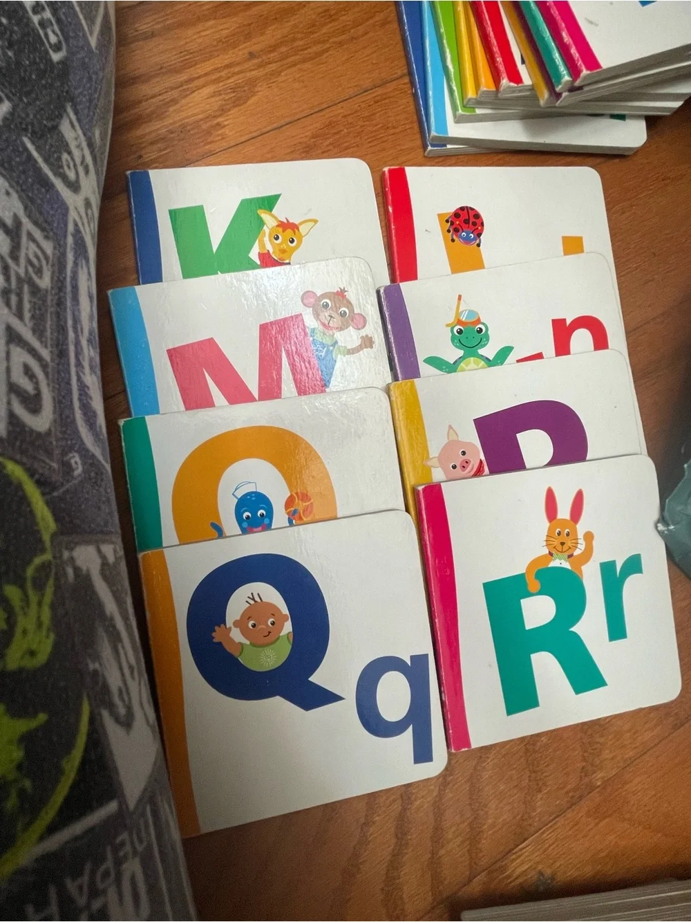 Disney Baby Einstein Alphabooks Board Book Set - Blue, Green, Pink, Teal